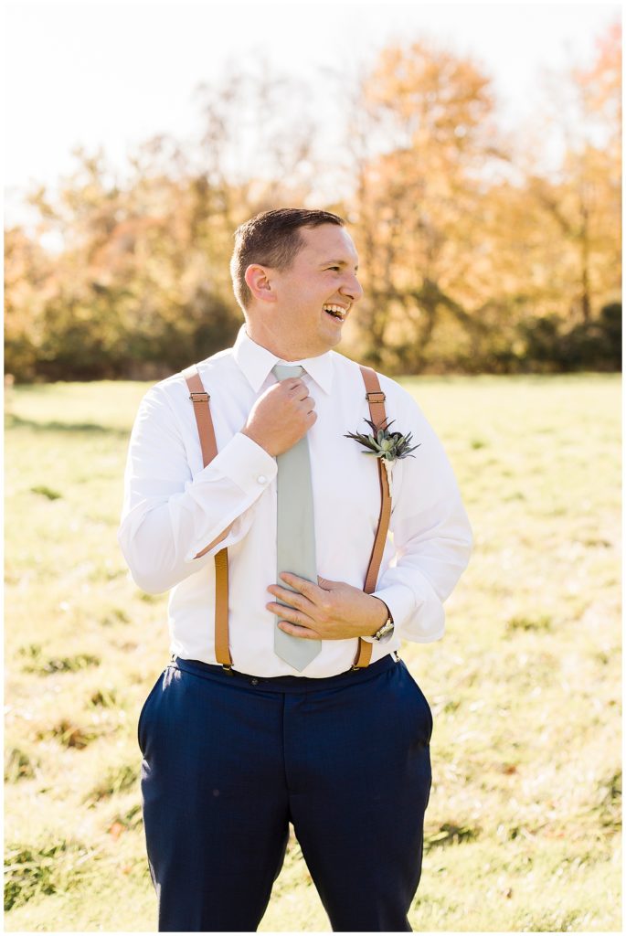 groom with suspenders